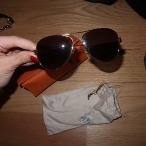 Tory Burch aviator sunglasses — comes with cover sleeve and case.